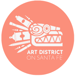 Art District Santa Fe Logo in white on peach circle